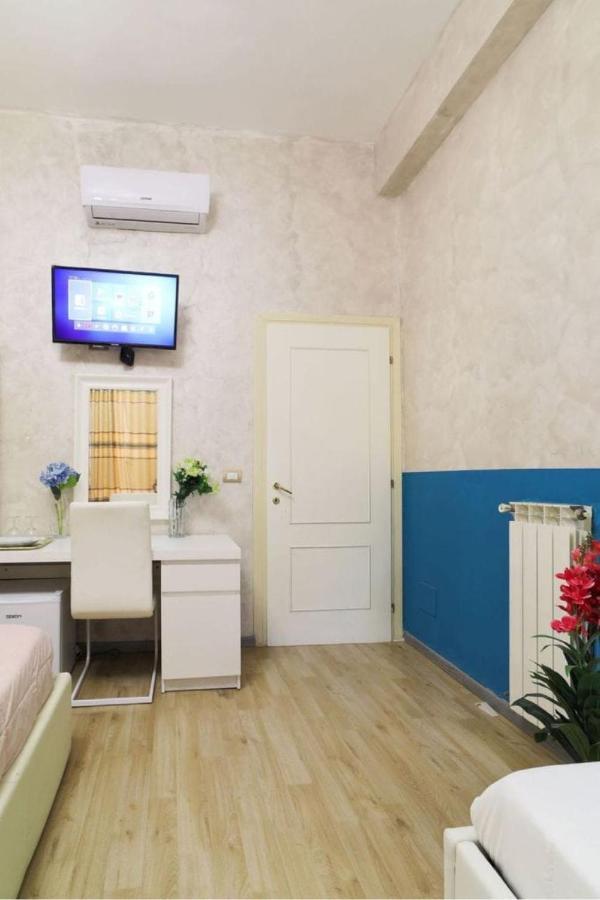 Quarto Quádruplo com Casa de Banho Privativa