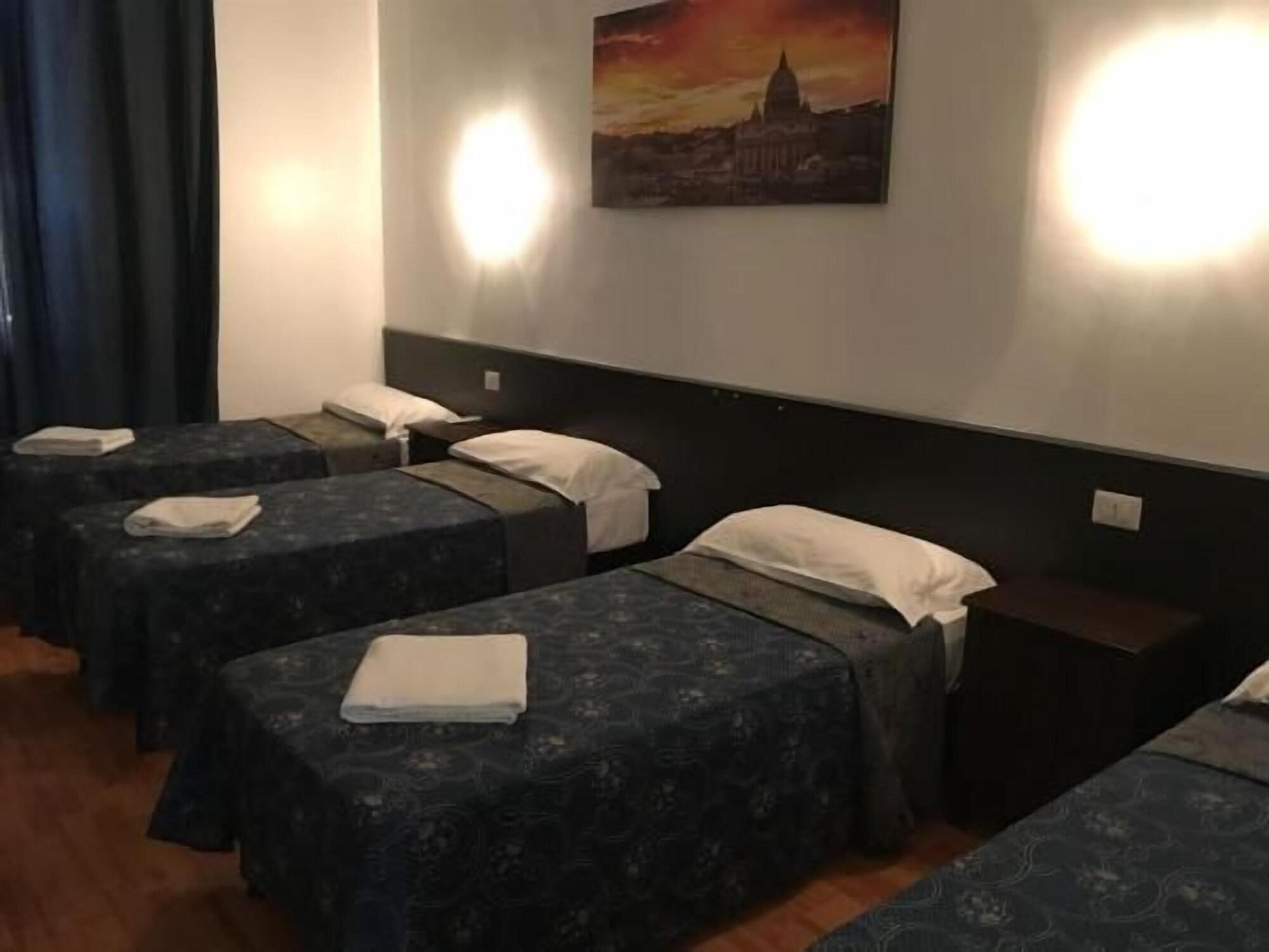 Vierpersoonskamer met Gedeelde Badkamer