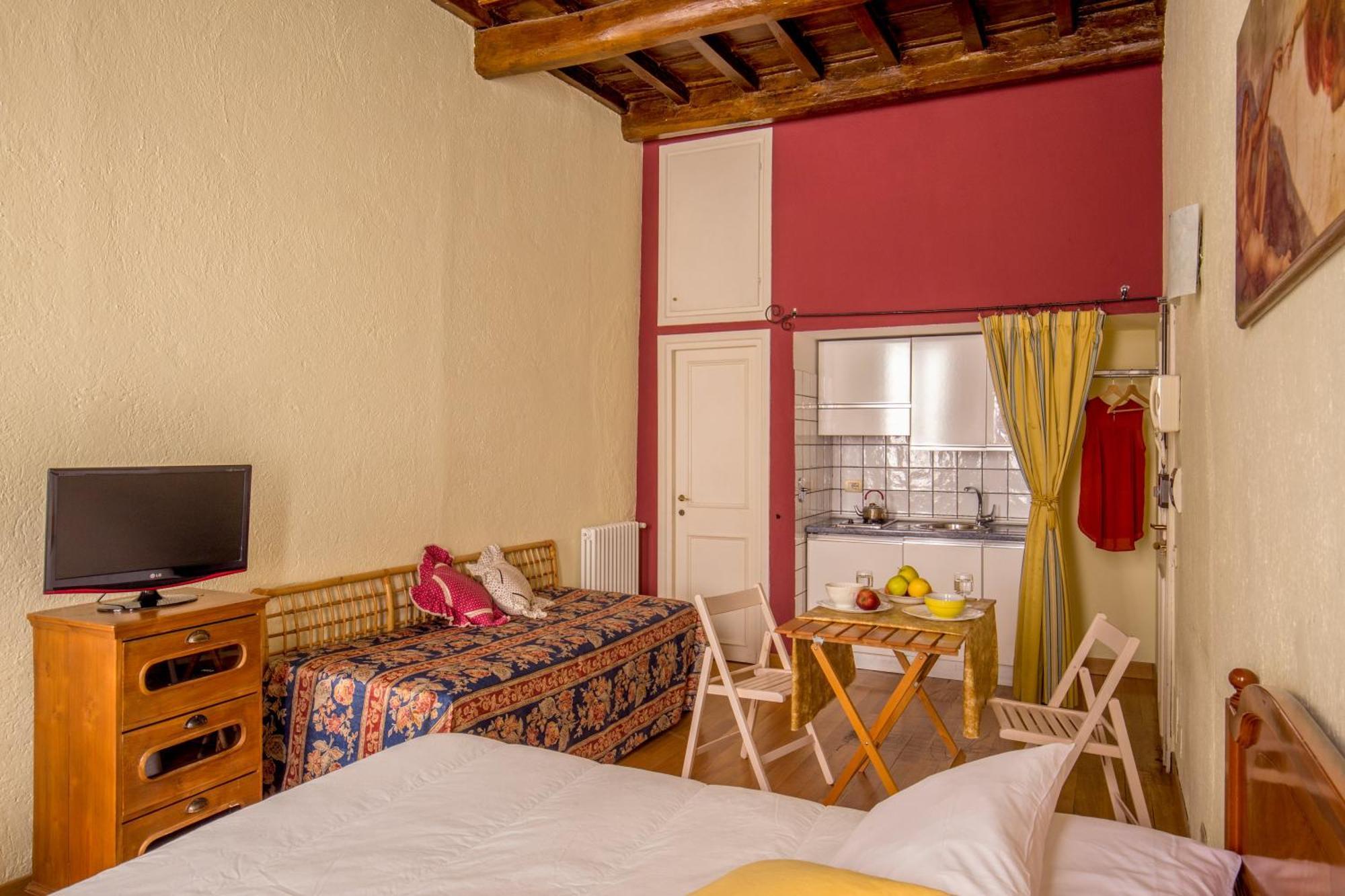 Quarto Quádruplo com Cozinha Compacta