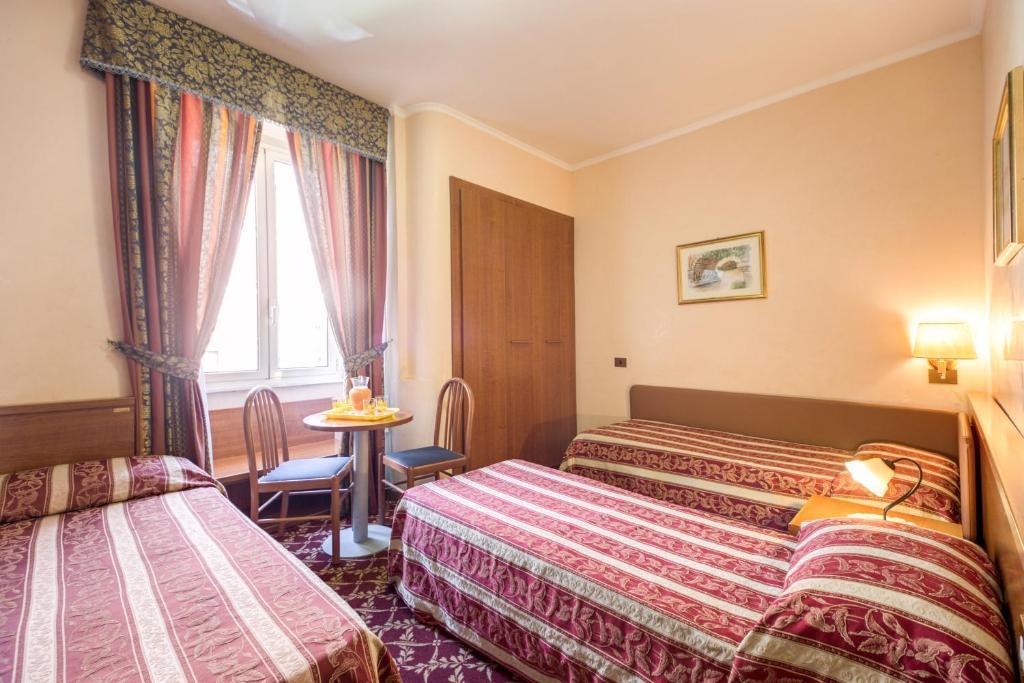 Quarto Quádruplo com Casa de Banho