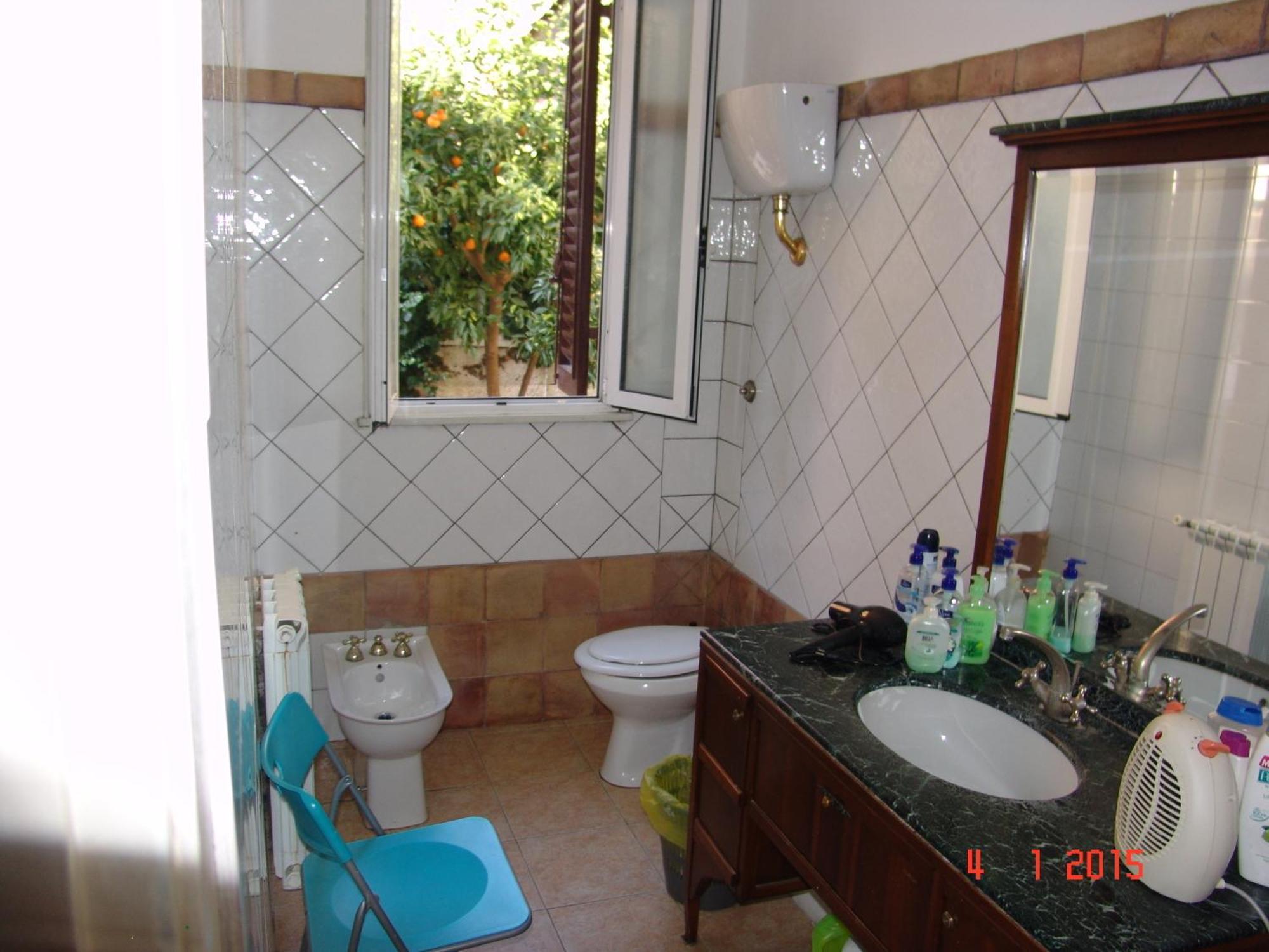 Quarto Duplo com Casa de Banho Partilhada